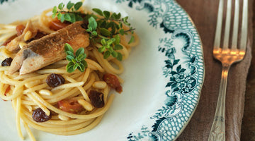 spaghetti-with-mackarel-cherry-tomatoes-pine-nuts-and-raisins